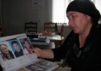Zalina Guburova mourns the death of her son and mother in the siege