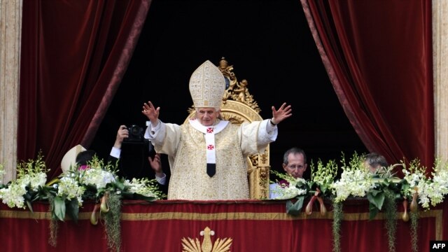 Pope Benedict XVI delivers his Easter message and blessing to Catholics from St Peter's Basilica at the Vatican.