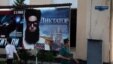 A poster for the film "The Dictator" on a street in the Uzbek capital, Tashkent