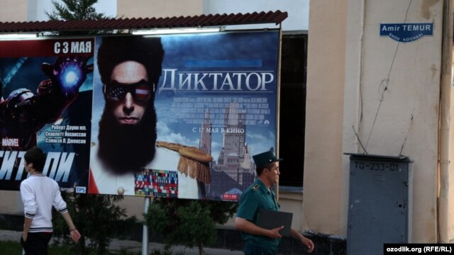A poster for the film "The Dictator" on a street in the Uzbek capital, Tashkent