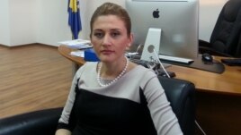 Kosovo's Deputy Prime Minister Mimoza Kusari-Lila says the government's political agenda has distracted it from dealing properly with economic woes.