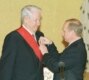 Russia – Politics – President Vladimir Putin (R) gives his predecessor, Boris Yeltsin, a state medal for services to the country, Moscow, 30Nov2001. Source: ITAR-TASS.