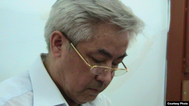 Former Zhanaozen Mayor Zhalghas Babakhanov sits in the court in July.