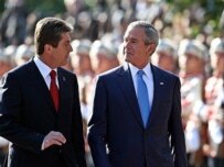 Bush with Parvanov (left) inspecting an honor guard in Sofia today (AFP)