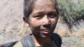 Eleven-year old Nurbek, working in a coal mine in Sulukta, Kyrgyzstan, 14 Aug 2012
