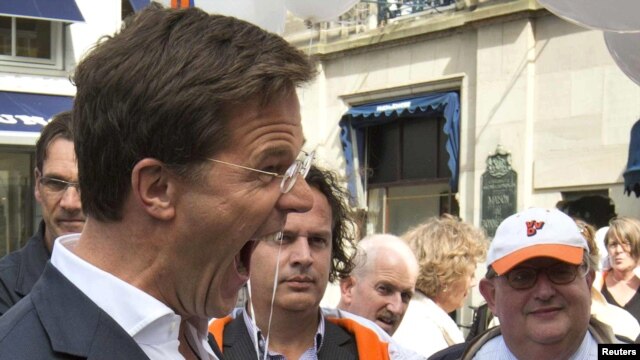 The result appeared to set the stage for the two pro-Europe parties to forge a coalition with Dutch Prime Minister Mark Rutte (pictured campaigning in The Hague) returning for a second term.