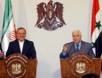 Syrian Foreign Minister Walid al-Muallim (right) with his Iranian counterpart, Manuchehr Mottaki (epa)