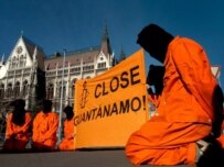 Members of Amnesty International in Budapest, Hungary protesting the Guantanamo Bay detention center (AFP)