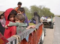 Pakistani families flee their village due to fighting between pro-Taliban militants and security forces in March (epa)