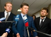 Kozak (center) with Ramzan Kadyrov in Grozny in July (ITAR-TASS)