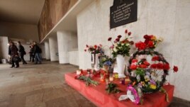 Minsk residents lay flowers at the Kastrychnitskaya subway station, the site of the April 2011 bombing, on March 19.