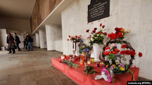 Minsk residents lay flowers at the Kastrychnitskaya subway station, the site of the April 2011 bombing, on March 19.