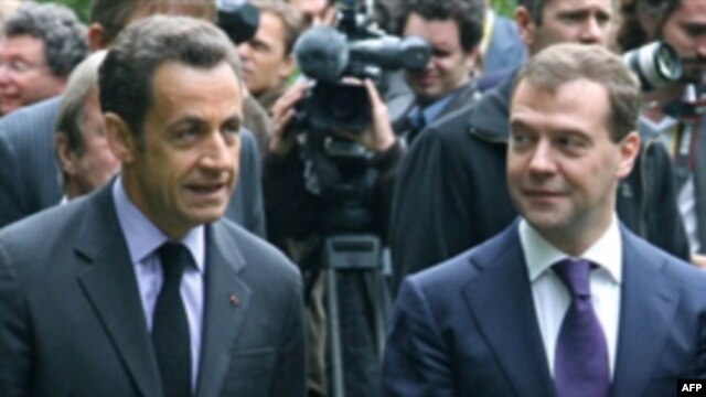 President Nicolas Sarkozy (left) wants the resumption of talks to be the centerpiece of the summit with Russia.