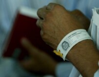 A former detainee wears an identification band after his release (file photo) (epa)