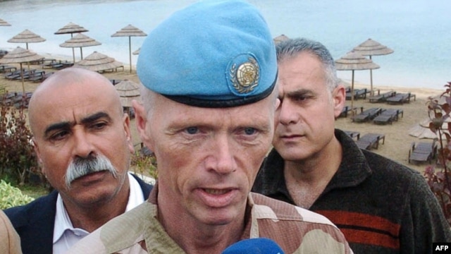 Syria -- The head of the UN observer mission in Syria, Major General Robert Mood, talks to local state-run television stations during a visit to the coastal city of Latakia in early May.