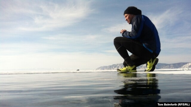 More than 100 people ran the marathon across Russia's Lake Baikal.
