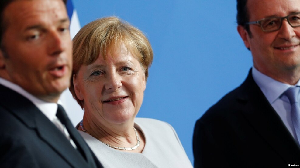 Italian Prime Minister Matteo Renzi with German Chancellor Angela Merkel (center), and French President Francois Hollande (right) in Berlin in June