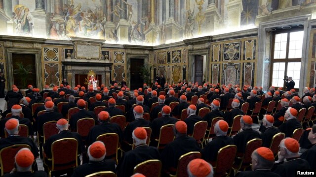 Pope Benedict XVI addressing a meeting of cardinals during his last such meeting at the Vatican on February 28.