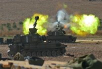 Israeli artillery firing into southern Lebanon on August 6 (epa)