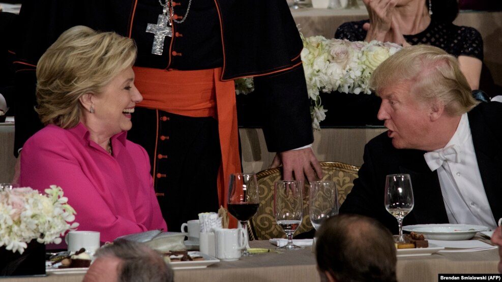U.S. Democratic presidential nominee Hillary Clinton (left) shares a word with her Republican rival Donald Trump at the Alfred E. Smith Memorial Foundation Dinner in New York earlier this month.