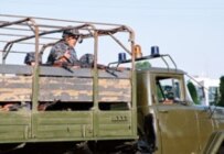 Troop reinforcements being brought into Andijon a day after the bloodshed (ITAR-TASS)