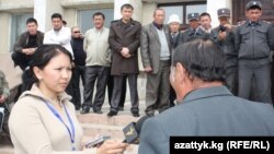 Radio Azattyk correspondent Zamira Kojobaeva (left, with microphone) interviewing protesters as the second Kyrgyz Revolution begins on April 6, 2010 with unrest in the western Kyrgyzstan city of Talas.