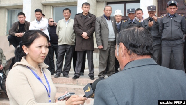Radio Azattyk correspondent Zamira Kojobaeva (left, with microphone) interviewing protesters as the second Kyrgyz Revolution begins on April 6, 2010 with unrest in the western Kyrgyzstan city of Talas.