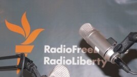 Microphones and RFERL logo on background