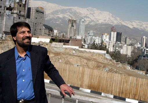Emad Baghi pictured after his release from prison against the backdrop of Tehran (courtesy photo)