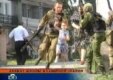 A television grab of the end of the seige in Beslan, September 3, 2004 (epa)