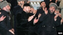Chechen leader Ramzan Kadyrov (center) has aggressively promoted a form of Sufi Islam in the Russian republic.