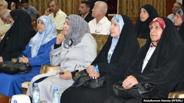 Iraqi women activists and legislators gather for a conference on women's empowerment in Basra in September. The new law seeks to compensate for some of the obstacles women face in getting work in Iraq today.