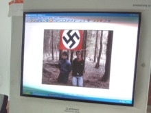Russia -- A web site of a Russian organization calling itself National Socialism/White Power shows two men kneeling on the ground with their arms and legs tied up, 14Aug2007