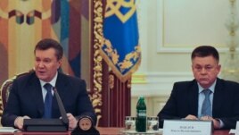 Украина президенті Виктор Янукович пен қорғаныс министрі Павел Лебедев. Киев, 14 ақпан 2014 жыл.