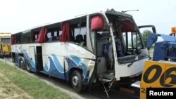 Serbian police says the deadly crash occurred when a Slovak bus swerved off the highway connecting Belgrade and Skopje.
