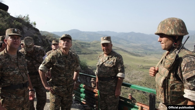 Armenia - Defense Minister Seyran Ohanian (second from left) inspects Armenian army positions on the border with Azerbaijan, 08Aug2012.