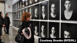 With "The Masses," Iranian artist Shirin Neshat's depicts those affected by oppression, protests, and civil unrest.