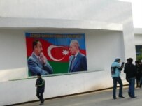 Ilham Aliyev (left)&nbsp;followed his father&nbsp;as president (RFE/RL)