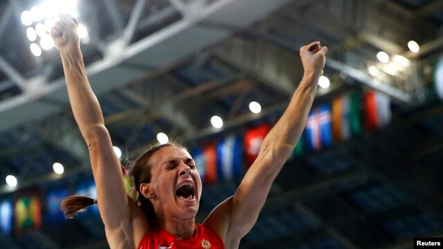 Yelena Isinbayeva reacts after winning the women's pole-vault final at the IAAF World Athletics Championships in Moscow on August 13.