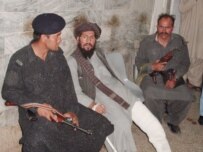 Pakistani police guard a suspected Taliban fighter arrested in Quetta last month (epa)
