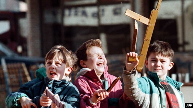 Children playing with toy guns in Sarajevo in 1996