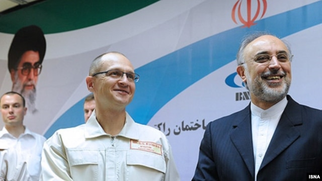 Russia's nuclear agency chief Sergei Kiriyenko (left) meets with his Iranian counterpart, Ali Akbar Salehi, before the launch of the Bushehr plant.