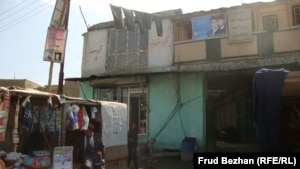 Mohammad Ahmadi's makeshift campaign office atop a barber shop in Kabul