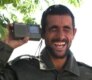 A radio listener in Afghanistan.  Radio Free Afghanistan is the most popular radio station in the country.