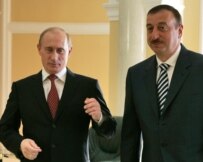 Putin (left) and Aliyev, seen here in Almaty in June, are meeting for the fourth time this year (file photo) (ITAR-TASS)