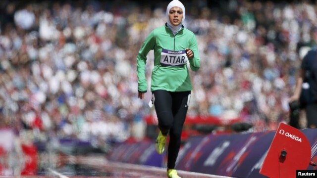 Saudi Arabia's Sarah Attar runs in her women's 800-meter heat at the London Games.