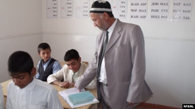 A teacher at a school in Tajikistan's Vose region