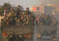 Lebanese Army troops on their way south on August 17 (AFP)