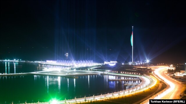 Baku's Crystal Hall by night, all $134 million of it -- does Azerbaijan need more equally expensive infrastructure projects?