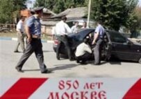 Police investigate the car of Ingushetia's Prime Minister Ibrahim Malsagov following a 25 August assassination attempt (AFP)